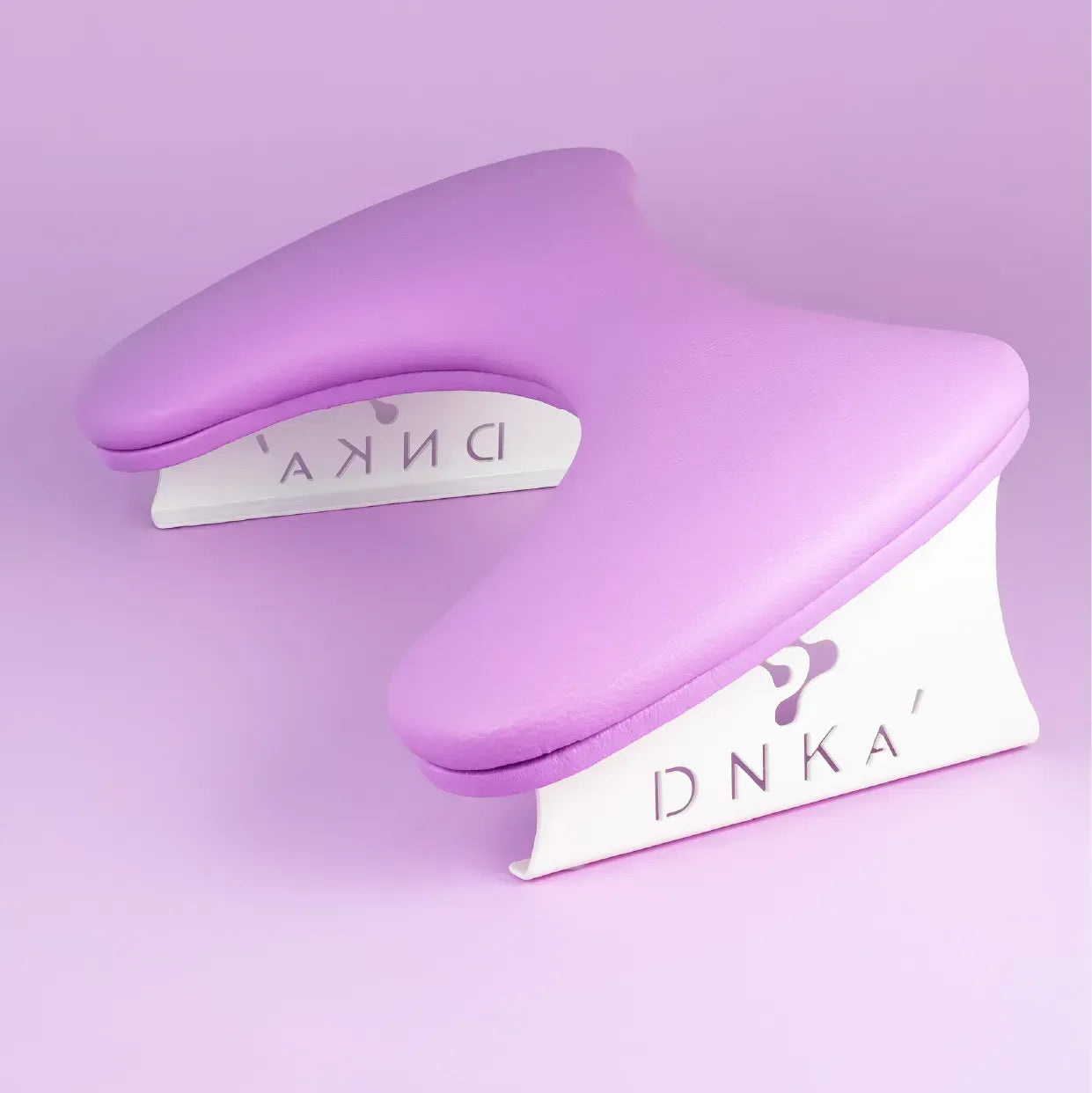 DNKa Anatomical Armrest for Manicure — purple, close-up of logo detail on leg