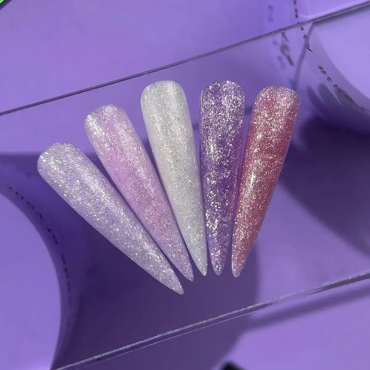 DNKa Builder Gel #0035 Vision — open jar with brush, lilac shimmer gel