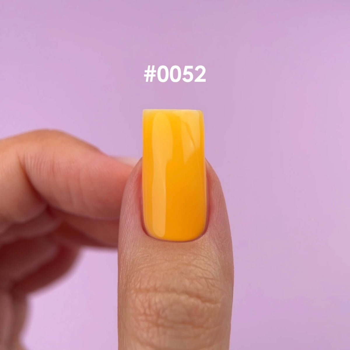 Saturated orange tone of DNKa Builder Gel #0052 Dopamine swatched on nails