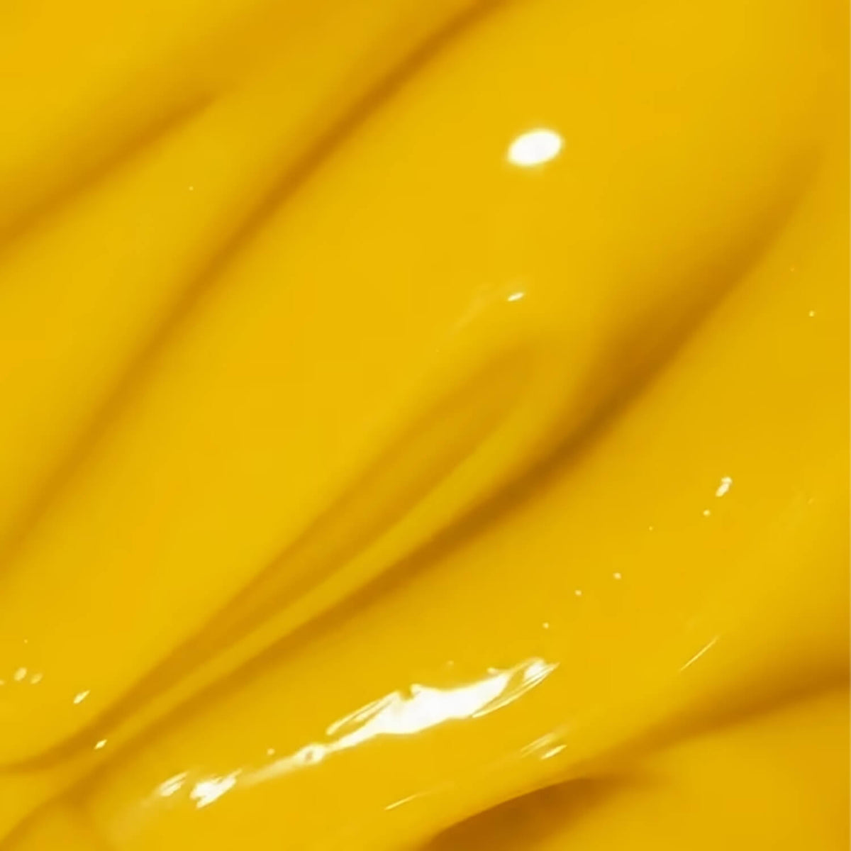 Close-up of the cured, rigid finish of DNKa Builder Gel #0052 Dopamine