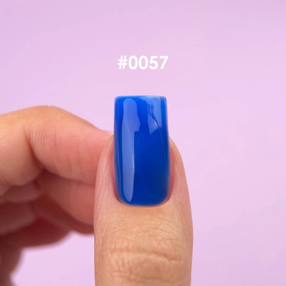 Ultramarine blue shade of DNKa Builder Gel #0057 Dopamine swatched on nails