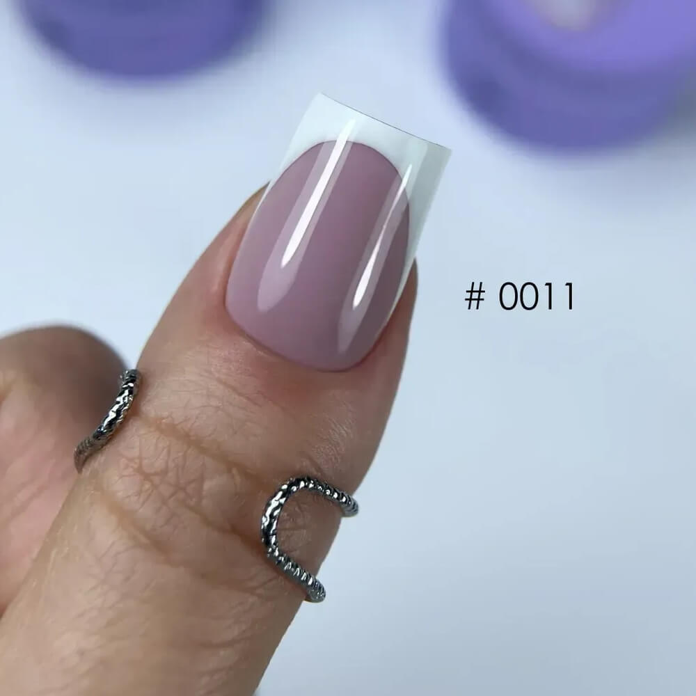 30ml — DNKa Builder Gel Mousse #0011 — swatch on nail tip, pink nude modeling gel