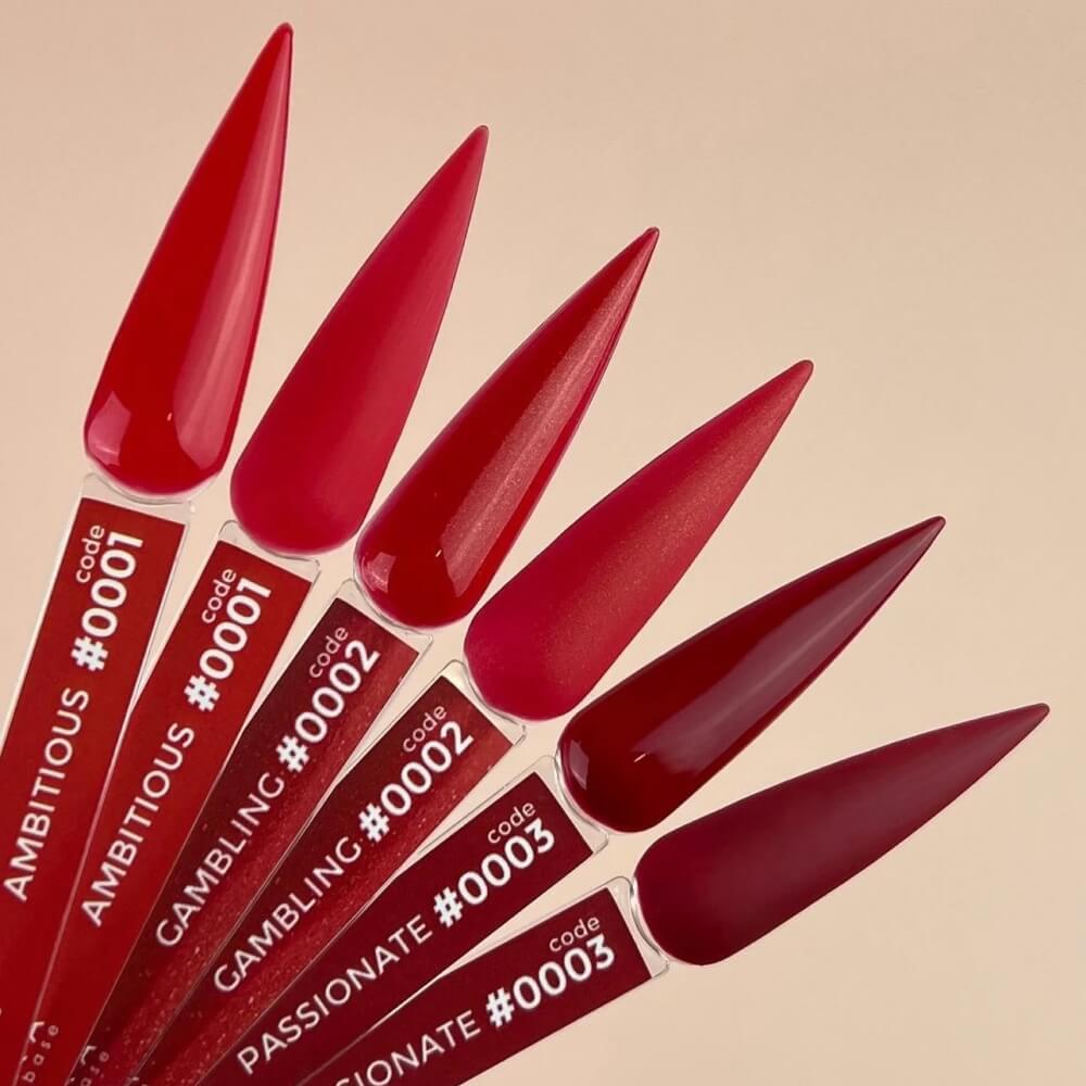 Close-up of the red and gold glitter finish of DNKa Cover Base #0002 Gambling