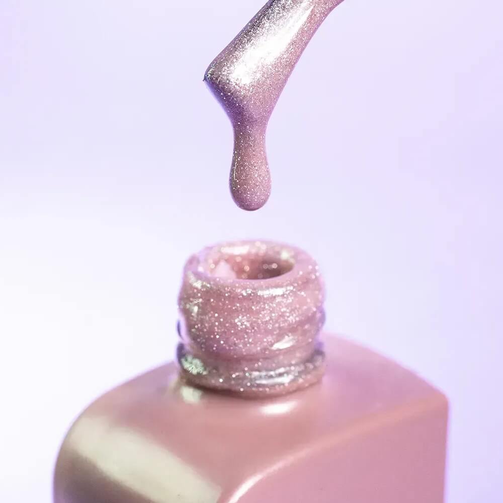 DNKa Cover Base #0012 Shining bottle tilted to catch the light on the shimmer