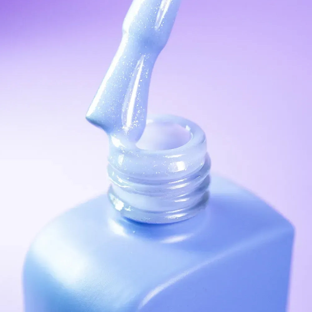 Side angle of the DNKa Cover Base #0015 Cosmic bottle and brush applicator