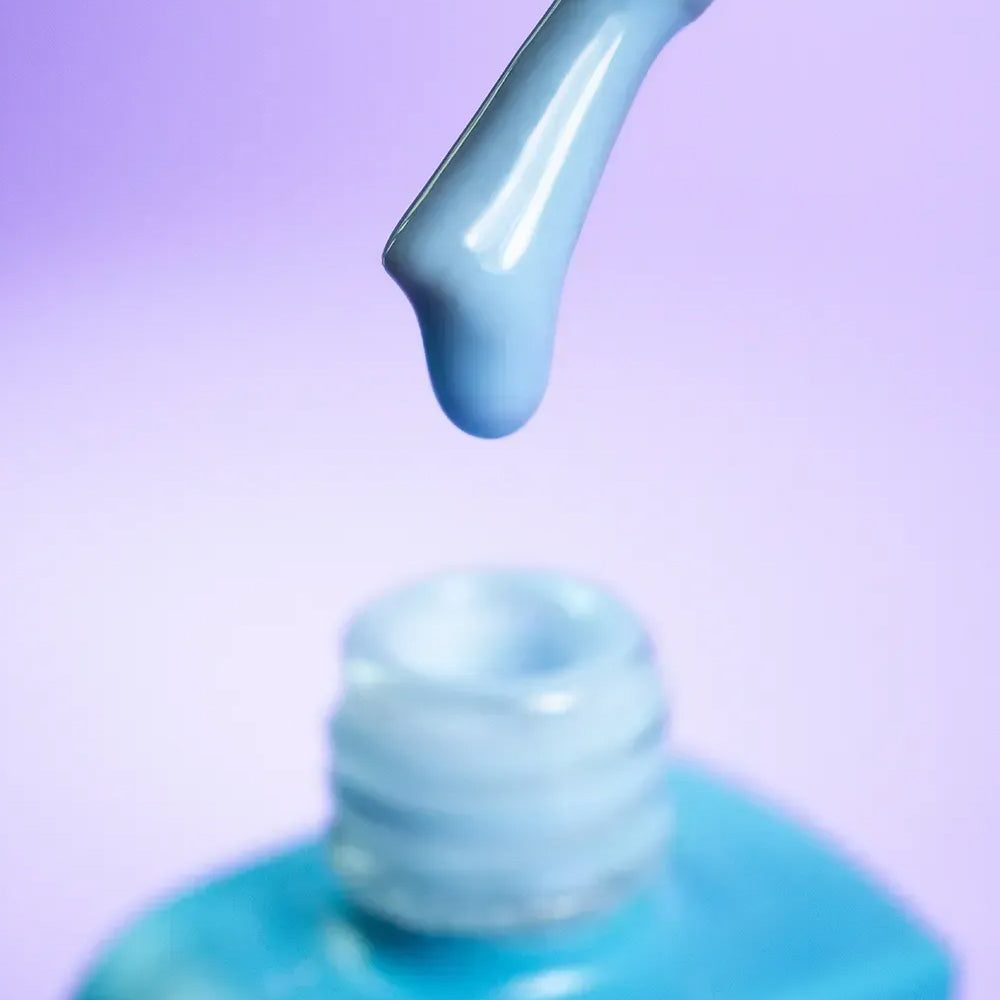 Minimalist manicure finished with DNKa Cover Base #0016 Sincere under a glossy top coat