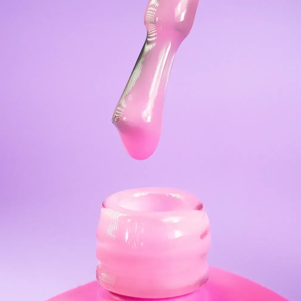 Close-up of the DNKa Cover Base #0025 Pretty Pink label and cap