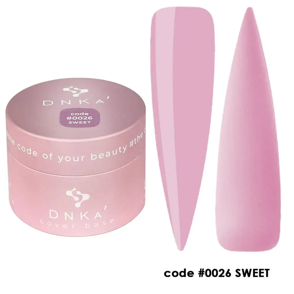 DNKa Cover Base #0026 Sweet bottle held next to a manicured hand
