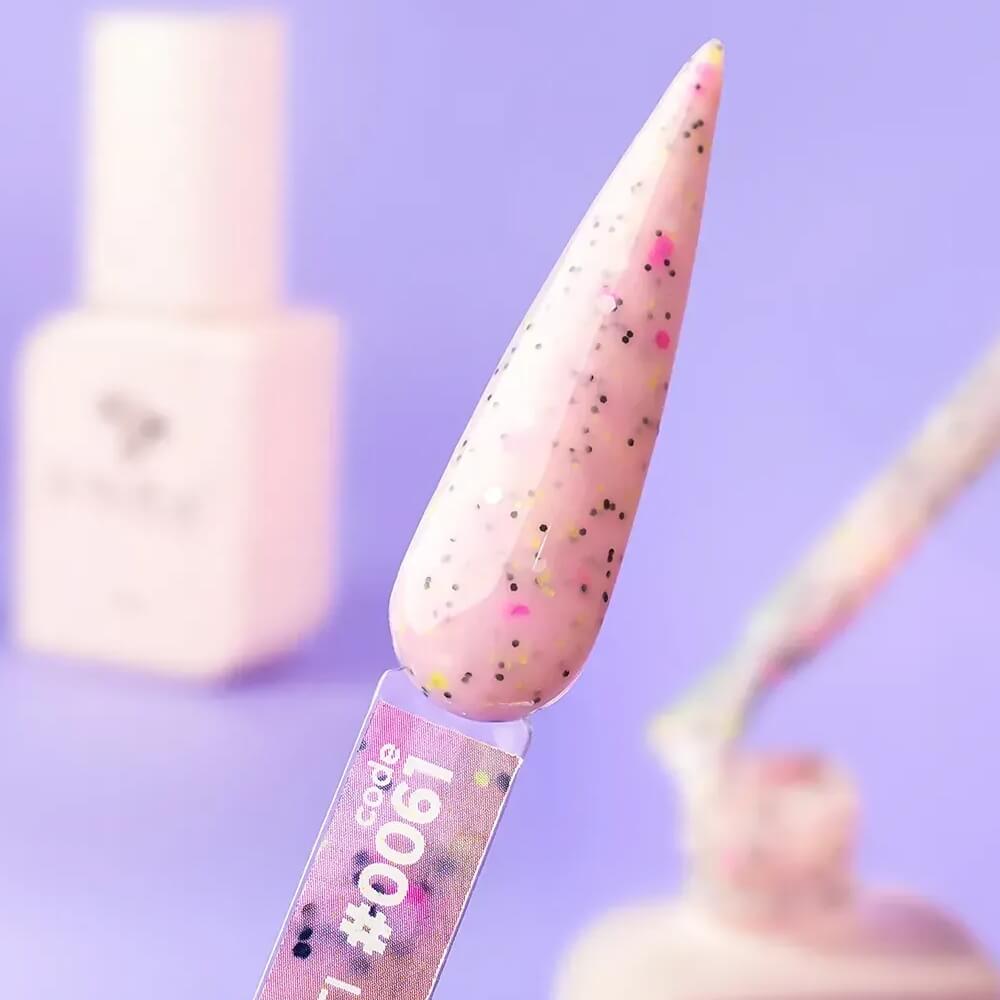 Close-up swatch of the 30ml Confetti shade, showing the pink base and multicolor confetti