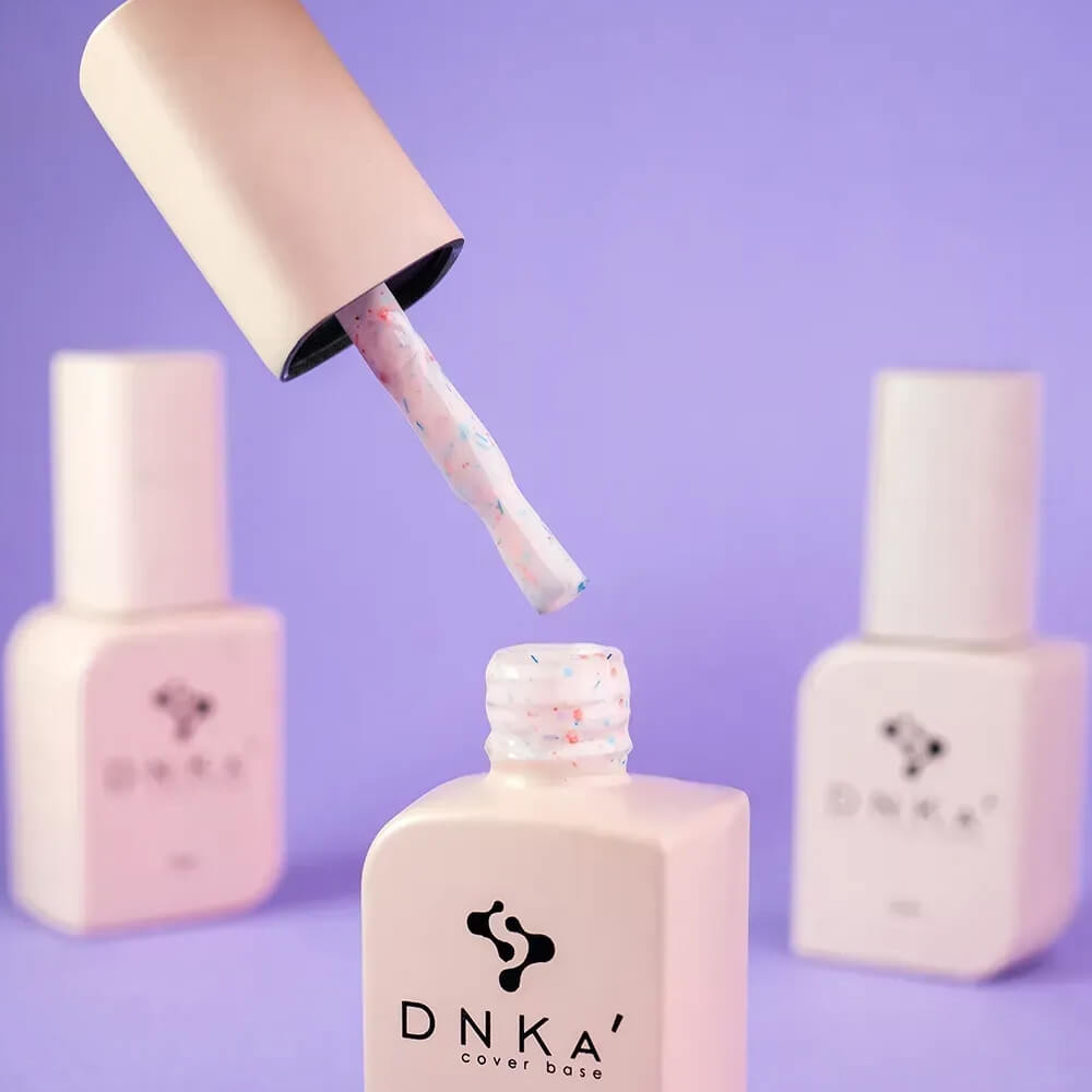 Freshly cured nails coated in 12ml Confetti, showing the pink base and fleck texture under light