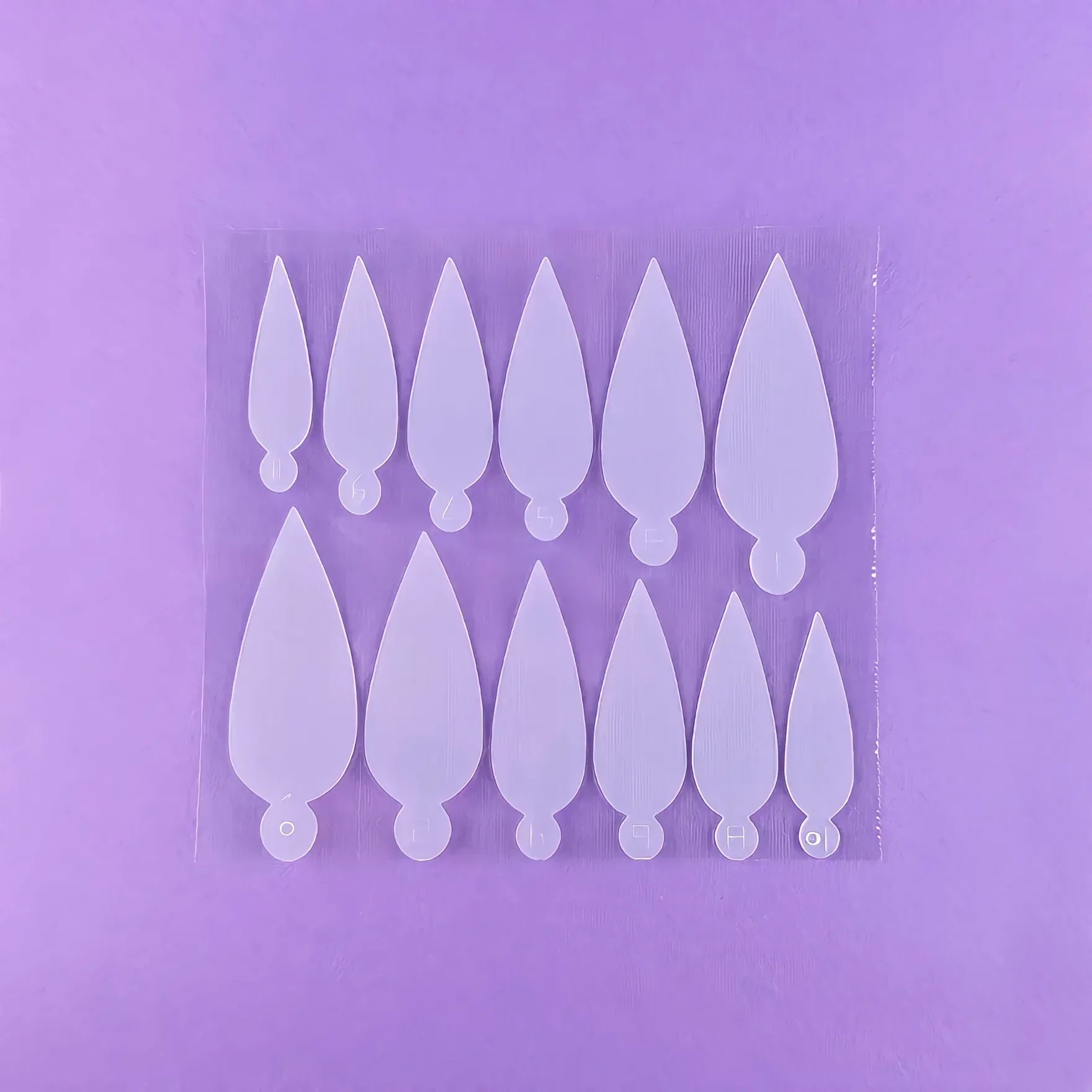 DNKa Professional Nail Molds #0001 — size range laid out