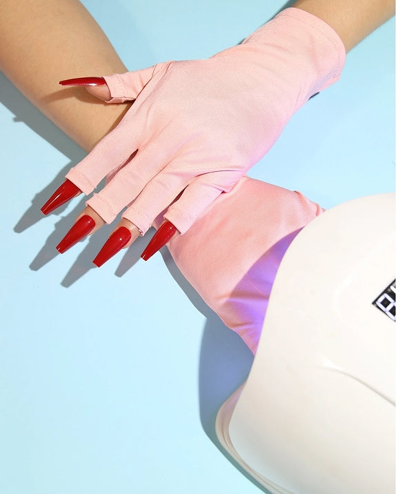 Pink fingerless manicure gloves for gel nail services