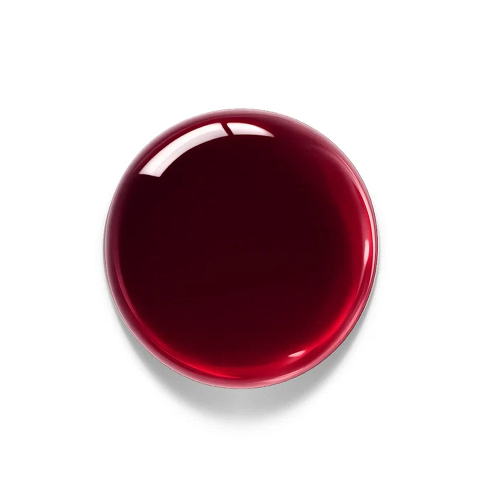 Luxio Cassis Gel Polish — swatch on nail tip, translucent berry finish