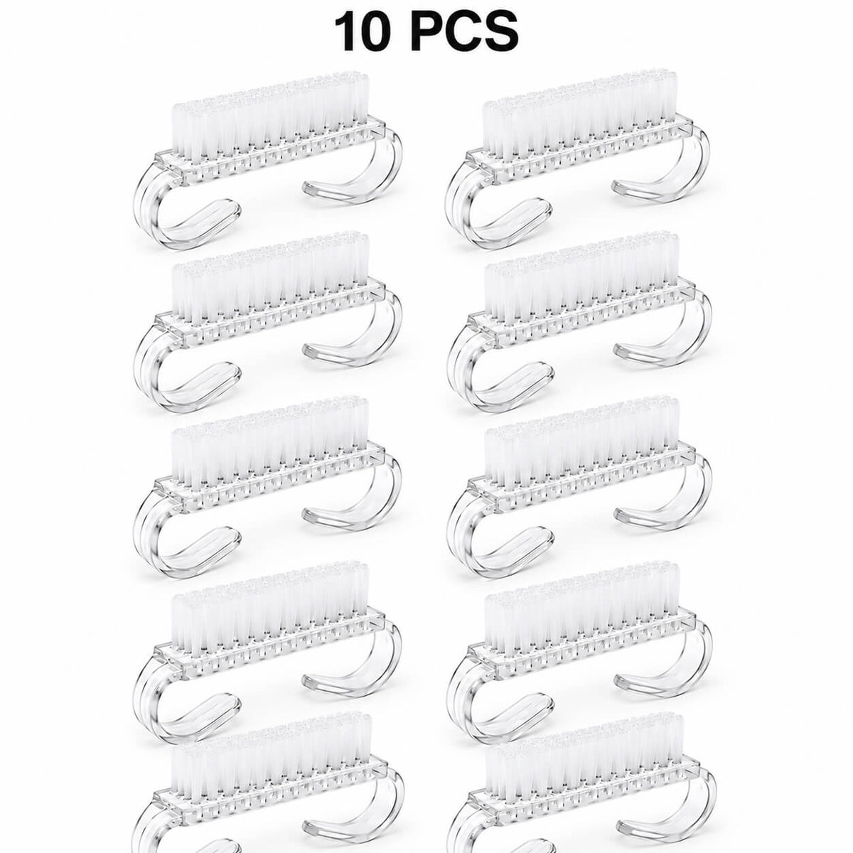 Manicure dust cleaning brush with nylon bristles on a nail table