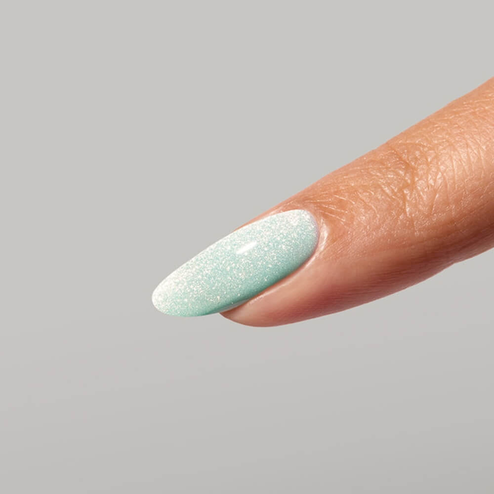 Aqua blue cat-eye manicure using Poolside Magnetic