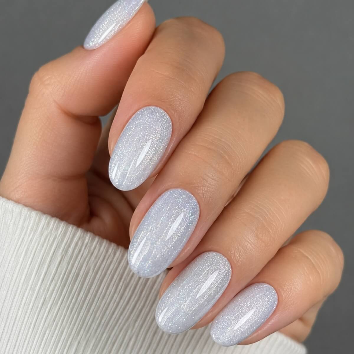 TOUCH Builder Gel Shine Bright 1 — swatch on nail tip, pearly lilac finish