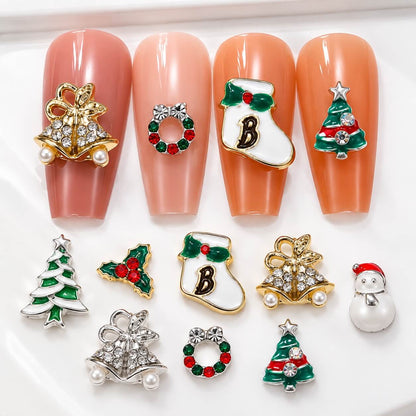 Holiday 3D nail decorations with colorful enamel-style details and sparkling rhinestones