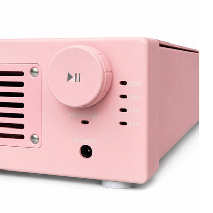 Close-up of the Aero Maxi pink speed knob and pause control