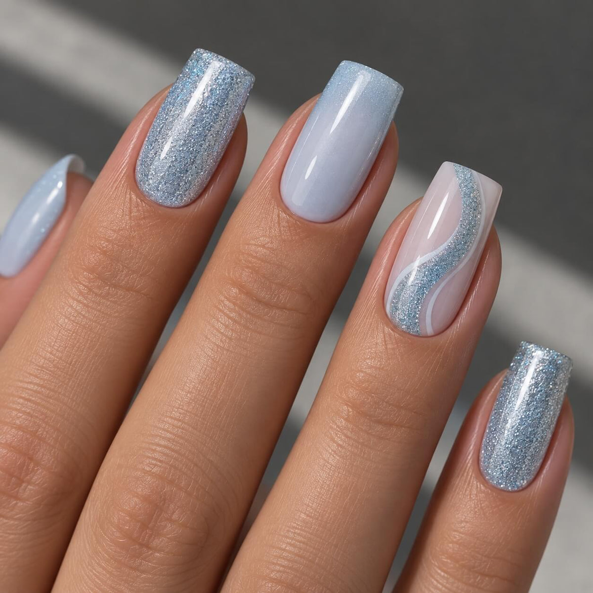 Akzentz Snow Blue light-reflective blue glitter gel for nails