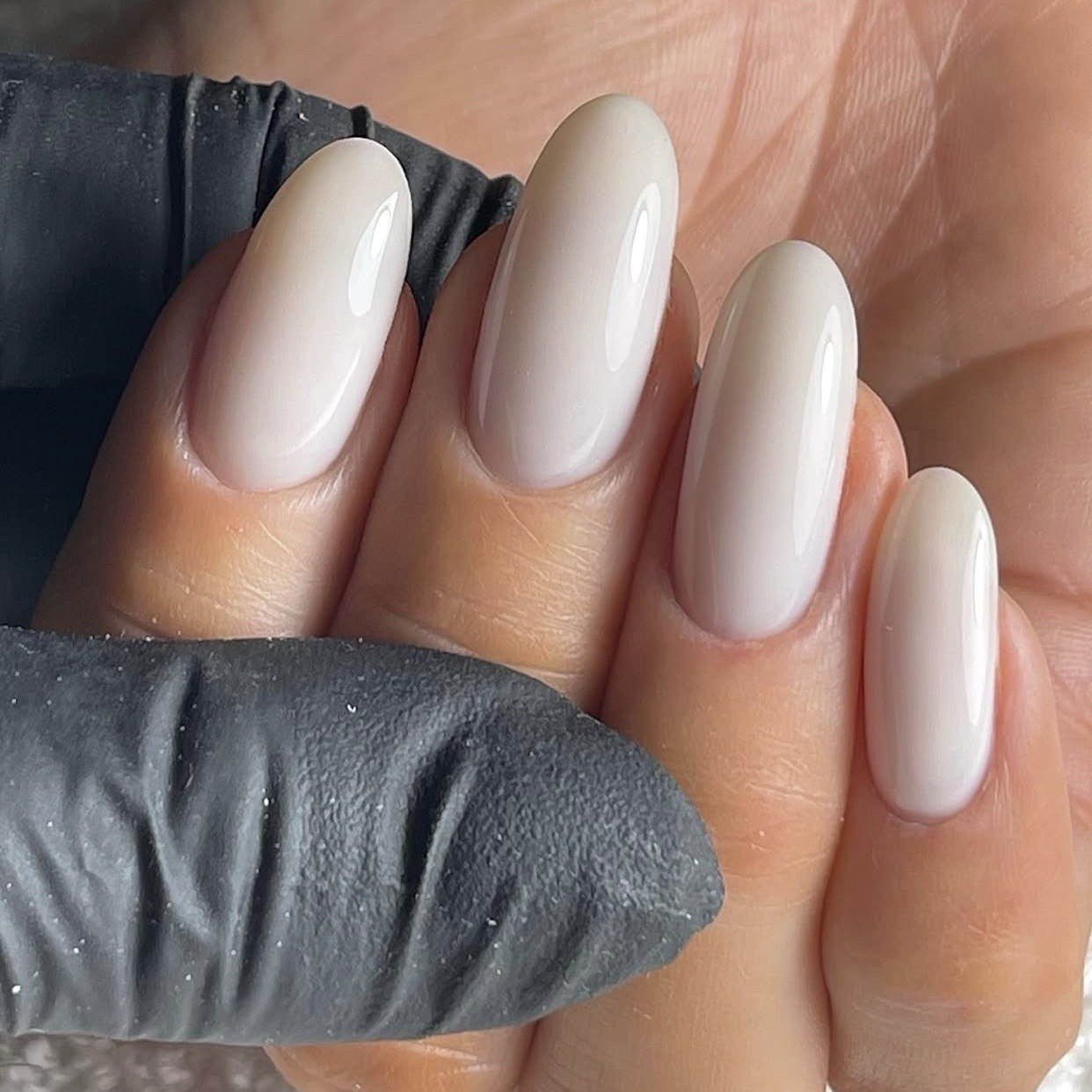 Close-up of clean white finish on Wall Street White nails