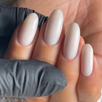Close-up of clean white finish on Wall Street White nails