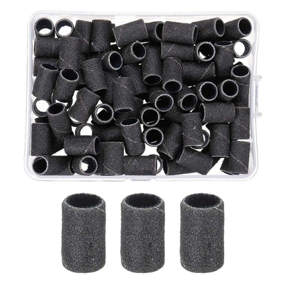 Black abrasive sanding bands in a clear plastic box