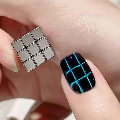 Teal cat eye nails with star, checkerboard and full-light effects
