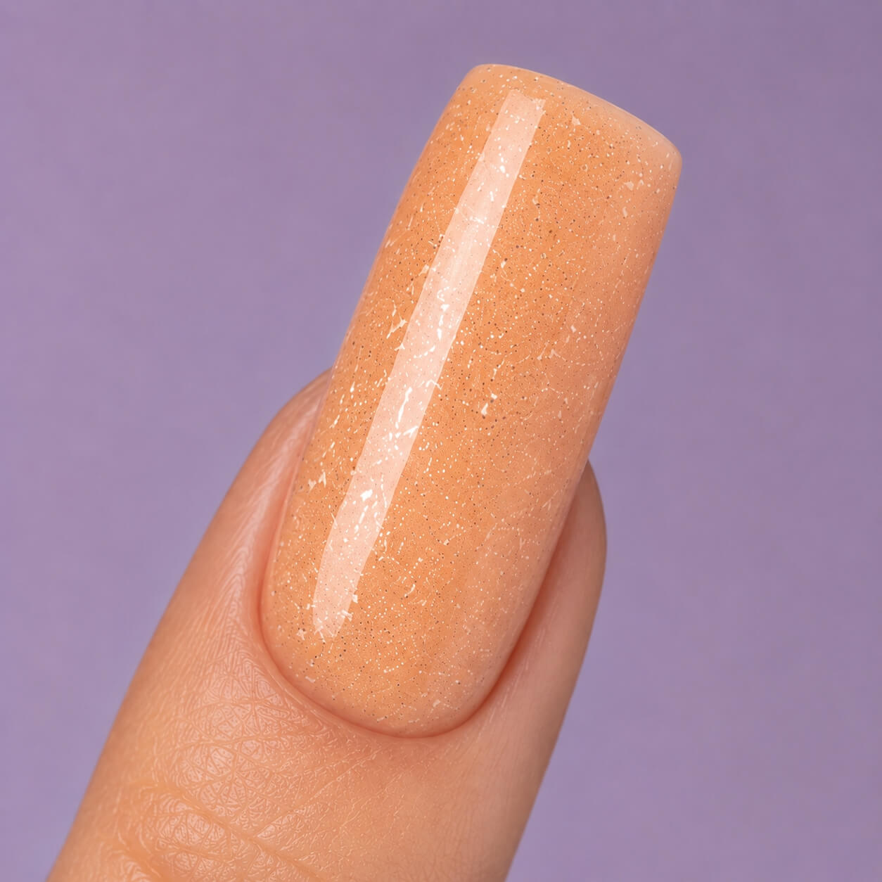 DNKa Builder Gel Hollywood Glow #0031 — swatch on nail tip, reflective beige glitter