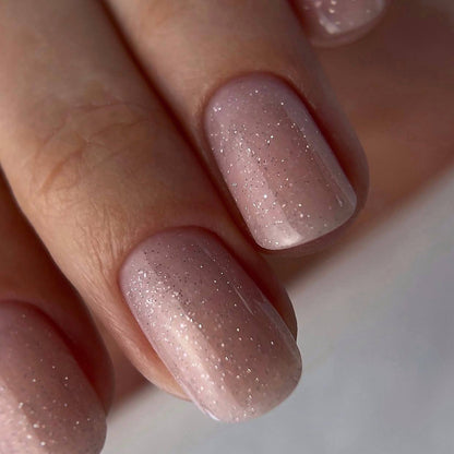 DNKa Builder Gel Hollywood Glow #0032 — open jar, reflective light pink glitter gel