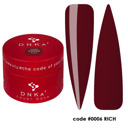 Close-up swatch of the burgundy finish of DNKa Cover Base #0006 Rich
