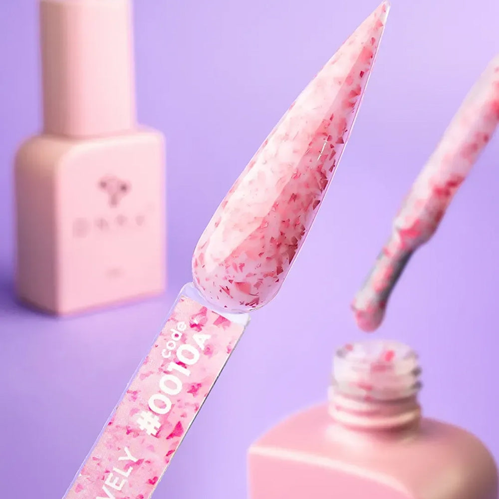 Close-up swatch showing the tonal pink sparkle in DNKa Cover Base #0010A Lovely