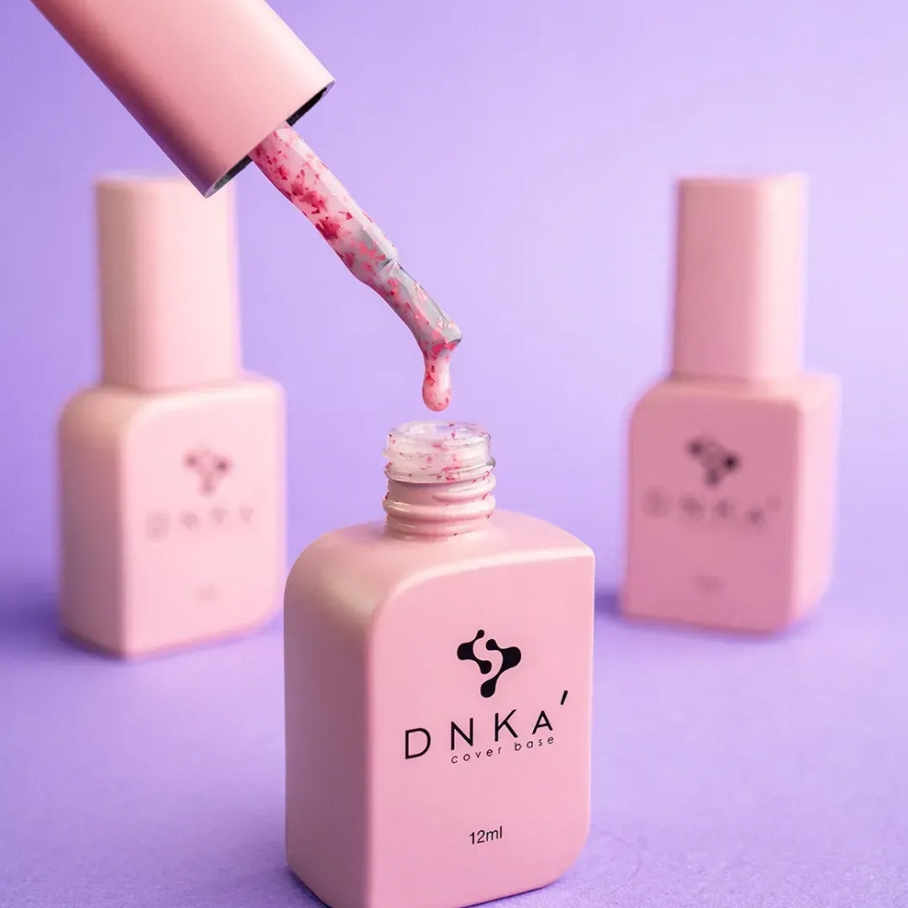DNKa Cover Base #0010A Lovely bottle tilted to catch the light on the sparkle