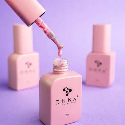DNKa Cover Base #0010A Lovely bottle tilted to catch the light on the sparkle