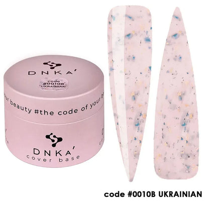 Nail technician applying DNKa Cover Base #0010B Ukrainian to a natural nail