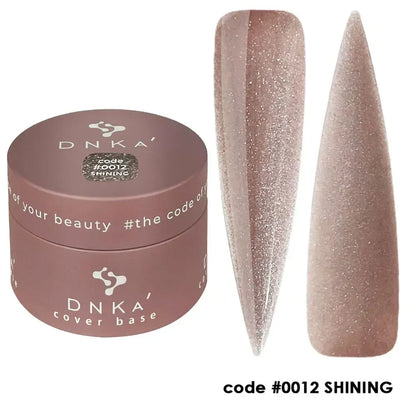 Finished manicure using DNKa Cover Base #0012 Shining under a LED lamp