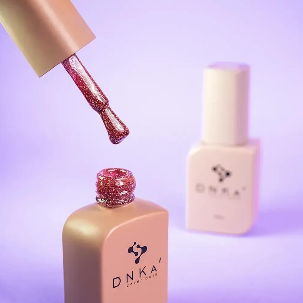 Close-up swatch showing the tonal red shimmer in DNKa Cover Base #0012A Confident