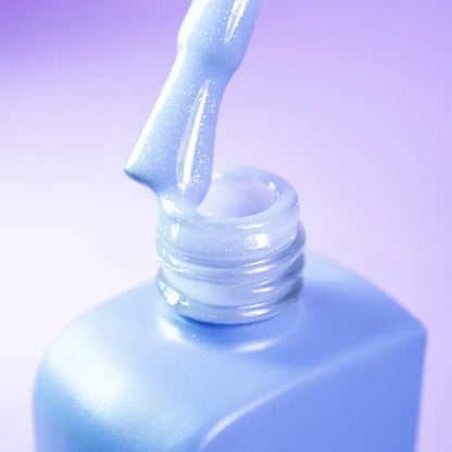Side angle of the DNKa Cover Base #0015 Cosmic bottle and brush applicator