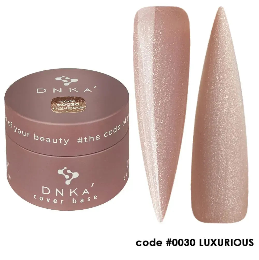 DNKa Cover Base #0030 Luxurious bottle held next to a manicured hand