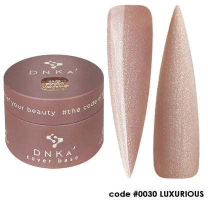 DNKa Cover Base #0030 Luxurious bottle held next to a manicured hand