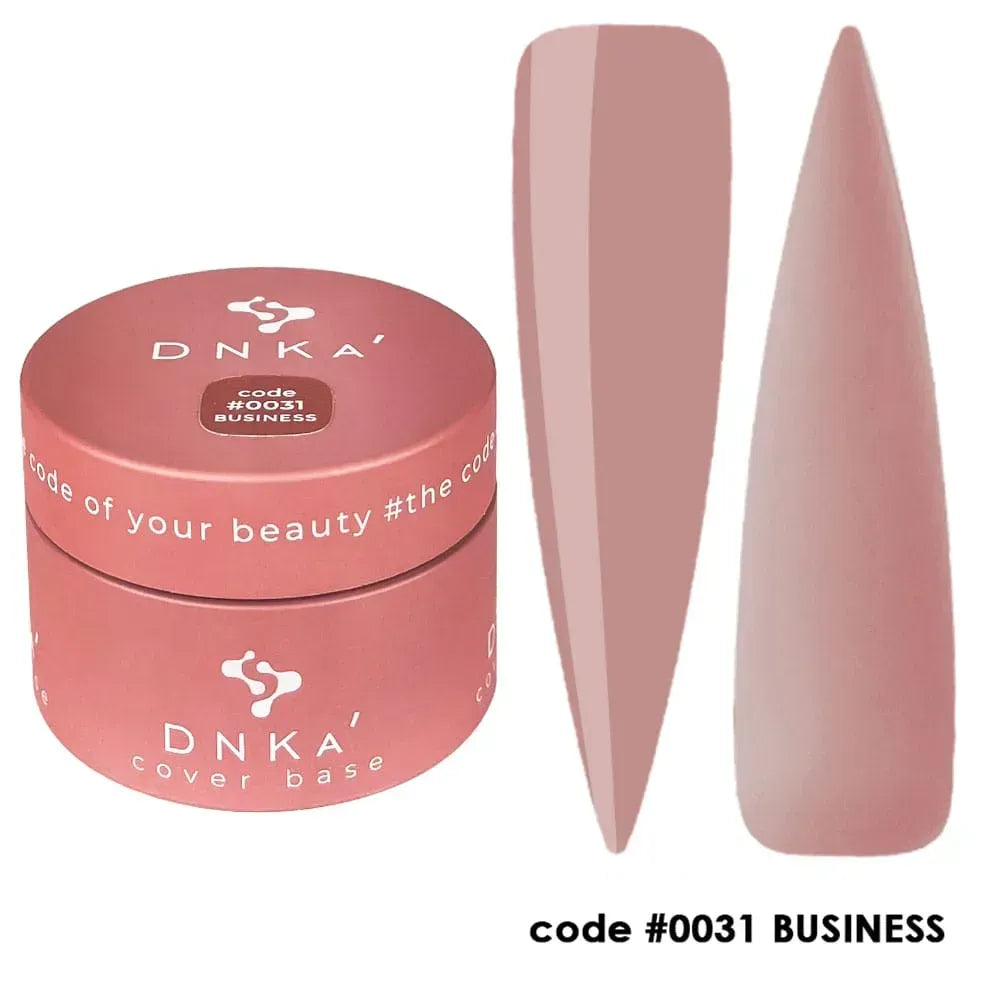DNKa Cover Base #0031 Business bottle held next to a manicured hand