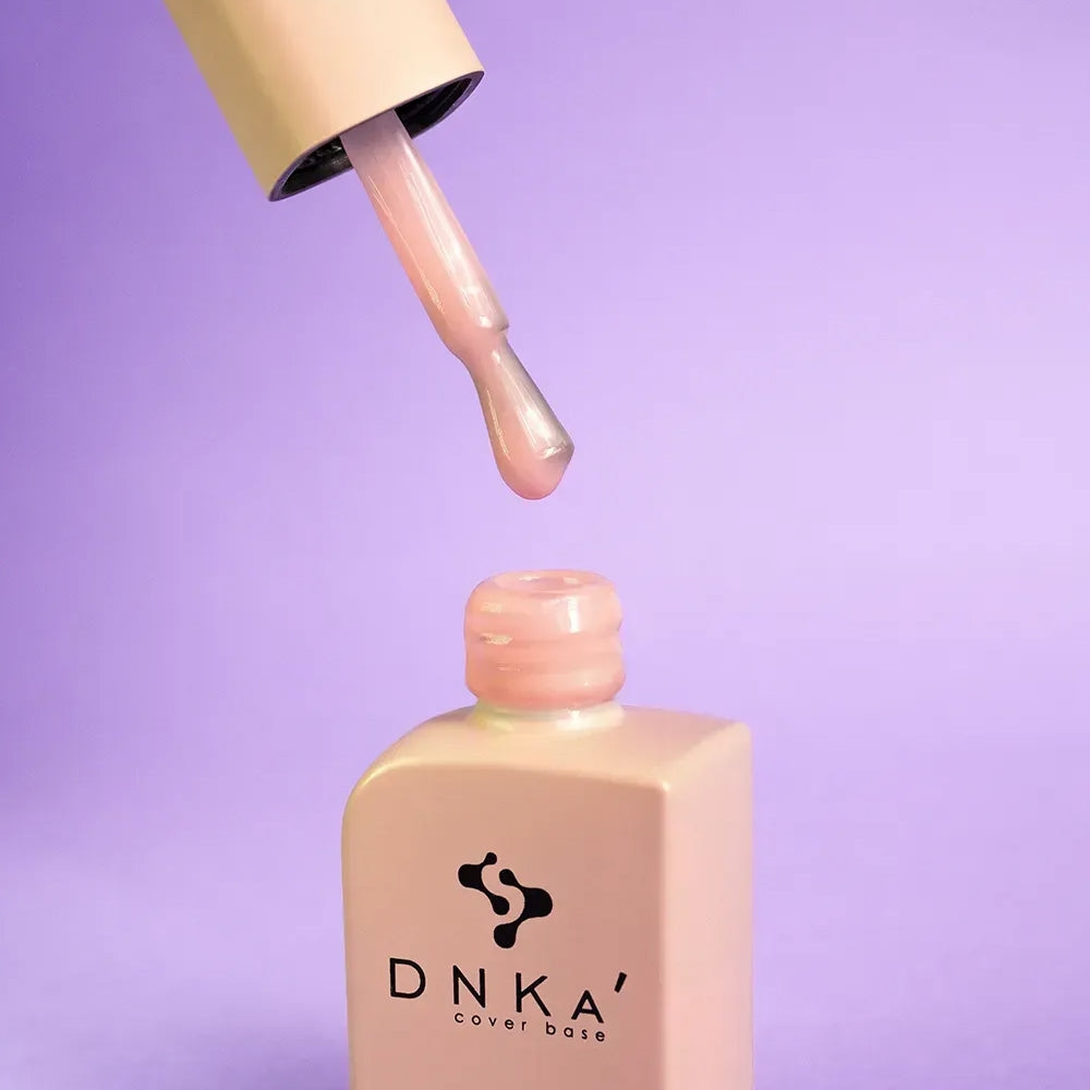 DNKa Cover Base #0036 Elegant peachy nude manicure on hand