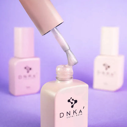 DNKa Cover Base #0040 Romantic warm pink manicure on hand