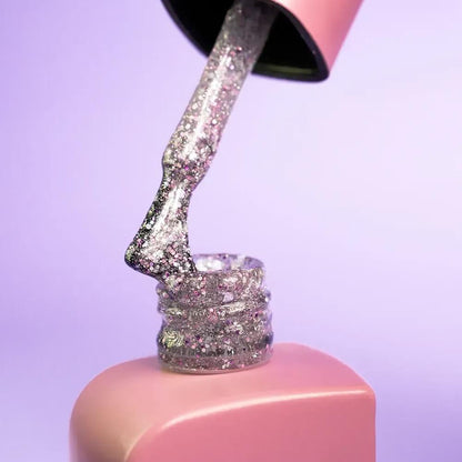 DNKa Cover Base #0050 Fancy sparkle manicure on hand