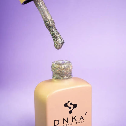 DNKa Cover Base #0051 Royal sparkle manicure on hand