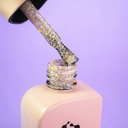 DNKa Cover Base #0052 Meteoric sequin manicure on hand