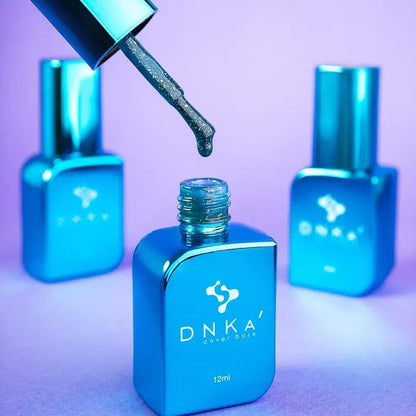 The brush and cap removed from the 30ml Aquamarine bottle, gold leaf visible on the applicator
