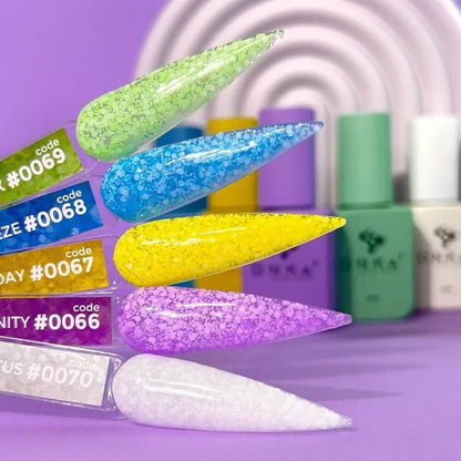 Close-up swatch of the 30ml Holiday shade, showing the transparent yellow tint and white flecks