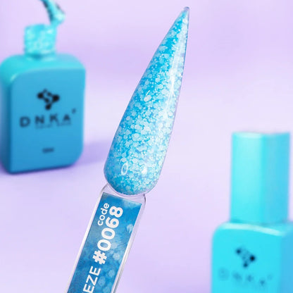 Closed 12ml bottle of DNKa Cover Base #0068 Breeze in sheer fluorescent blue