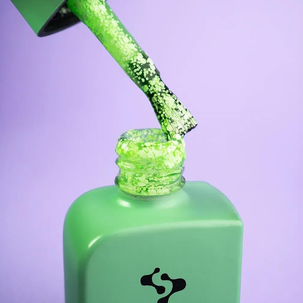 Freshly cured nails coated in 12ml Relax, showing the sheer neon green finish