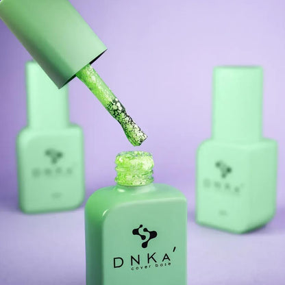 The brush and cap removed from the 30ml Relax bottle, green tint visible on the applicator